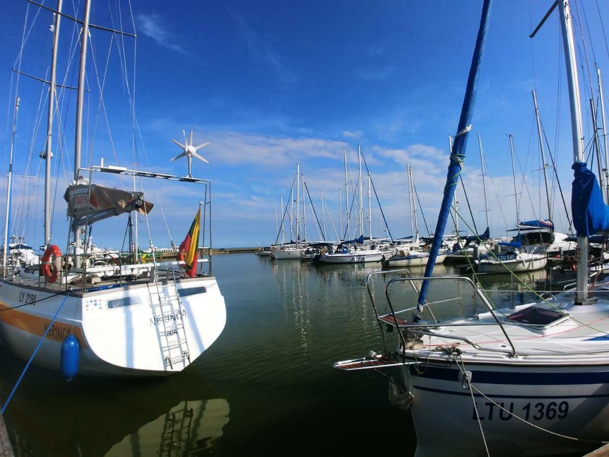 Zunda Hotel Nida Bagian luar foto